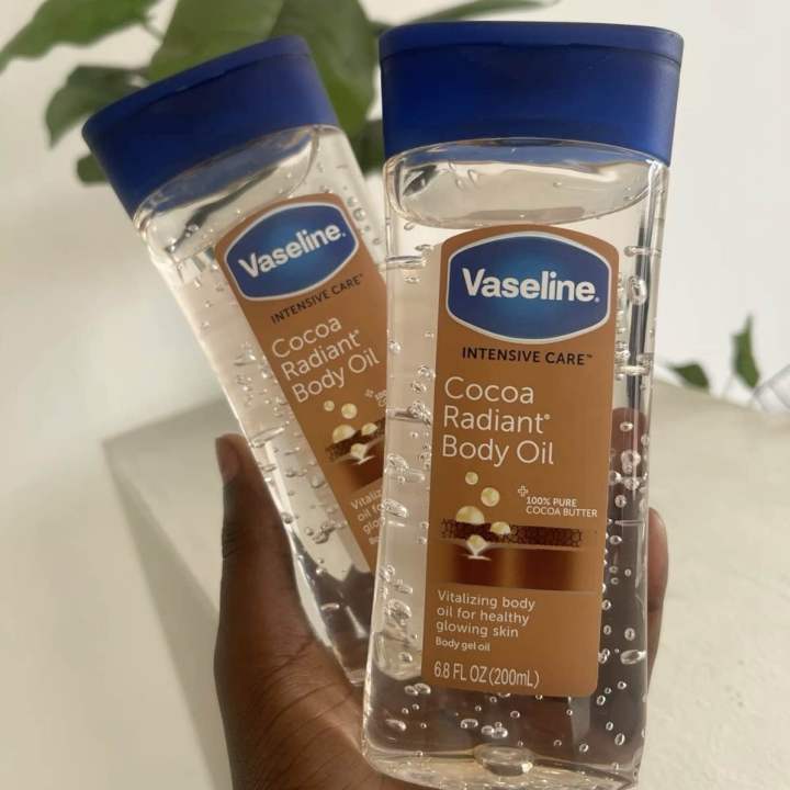 Vaseline Body Oil Intensive Care Cocoa Radiant Body Oil for Glowing skin Body Gel Oil made with Pure Cocoa Butter + Replenishing Oils 6.8 oz 200 ml