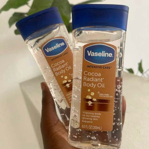 Vaseline Body Oil Intensive Care Cocoa Radiant Body Oil for Glowing skin Body Gel Oil made with Pure Cocoa Butter + Replenishing Oils 6.8 oz 200 ml